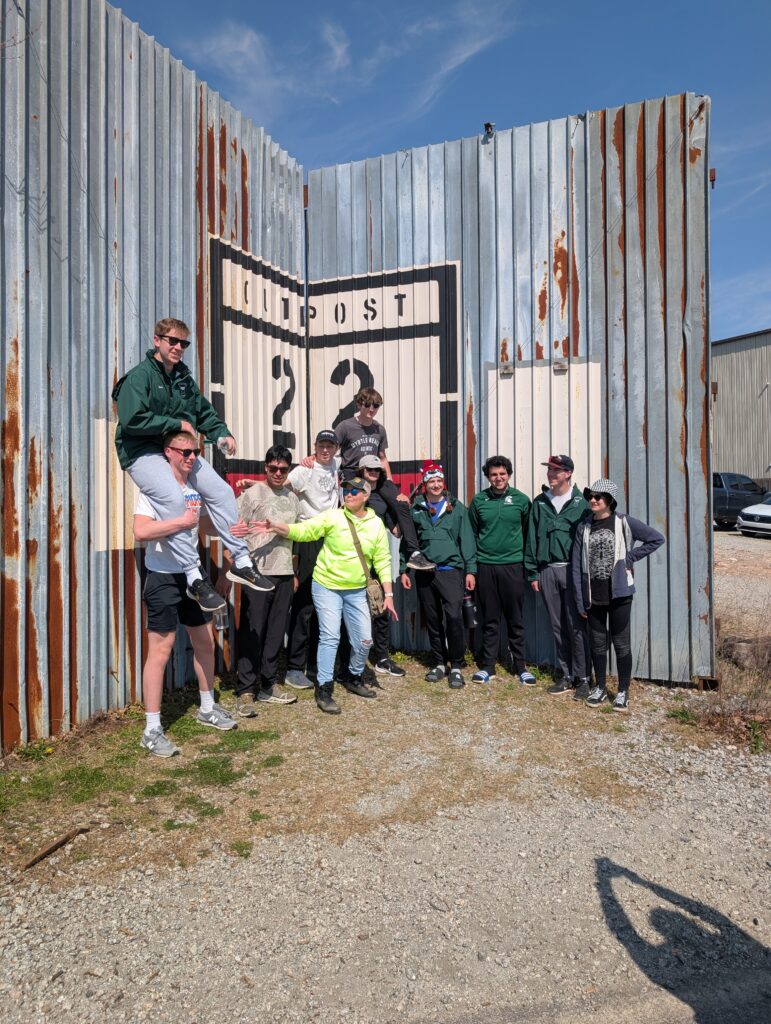 Group shot in front of the Gates of Alexandria