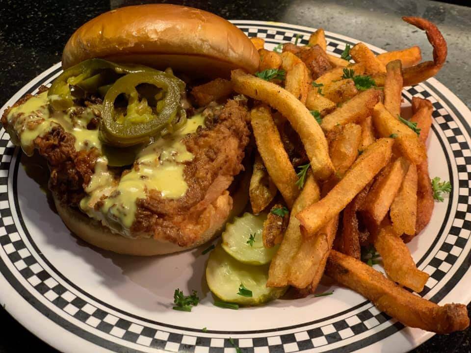 Crispy chicken sandwich with french fries