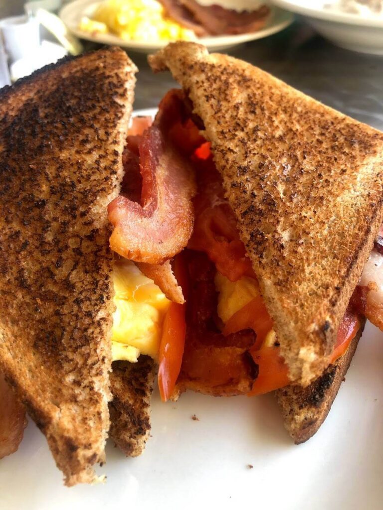 Breakfast sandwich with egg, bacon, and cheese